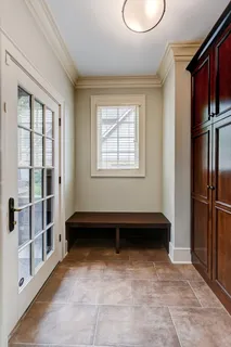 a view of workspace with window and cabinet
