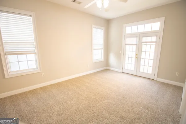 an empty room with windows