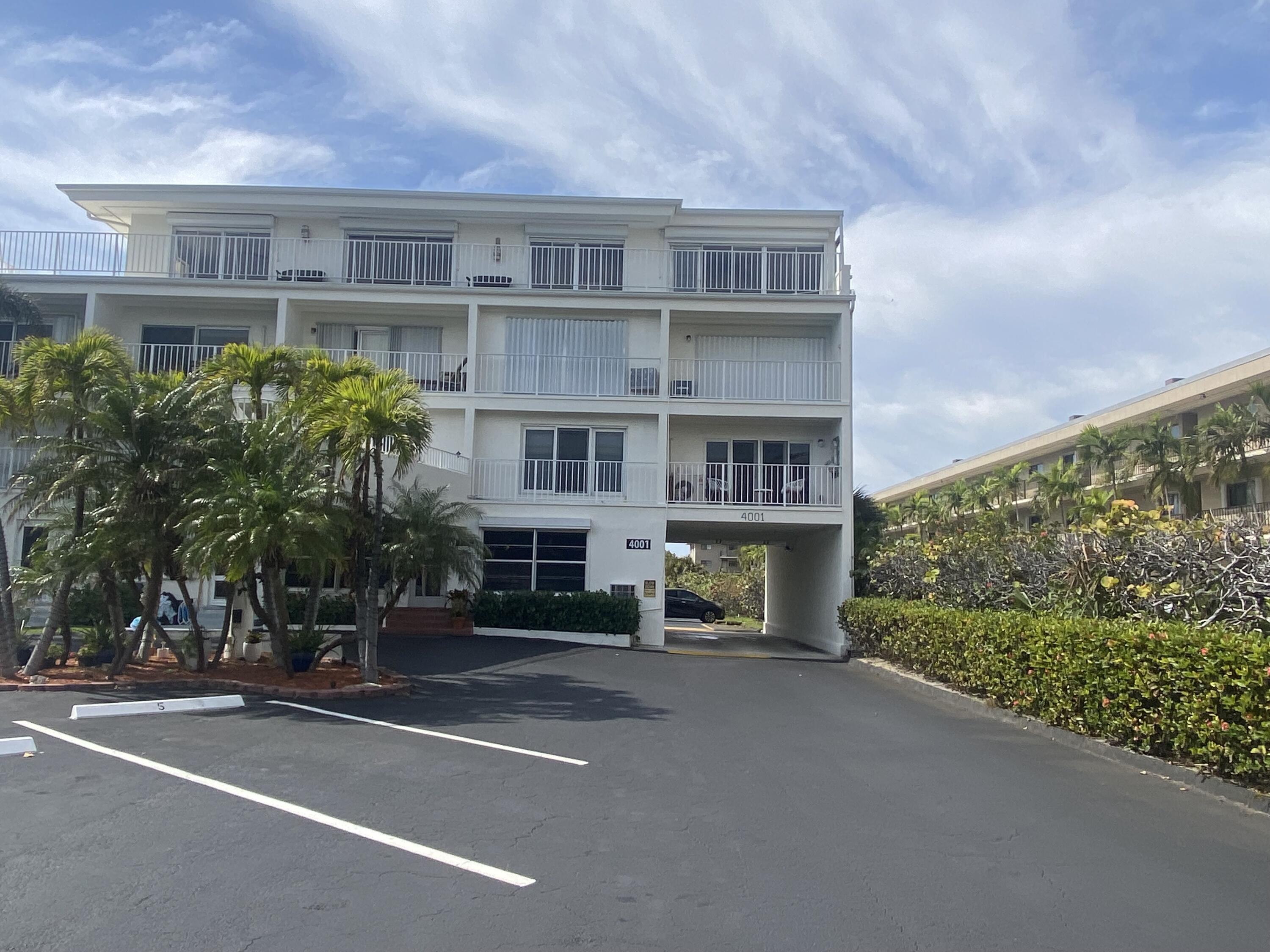 4001 South Ocean Boulevard, Unit 304 South Palm Beach, FL 33480 - Photo 13 of 14 a view of a building and a street