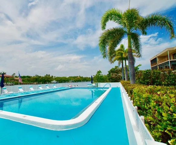 a view of swimming pool with a garden
