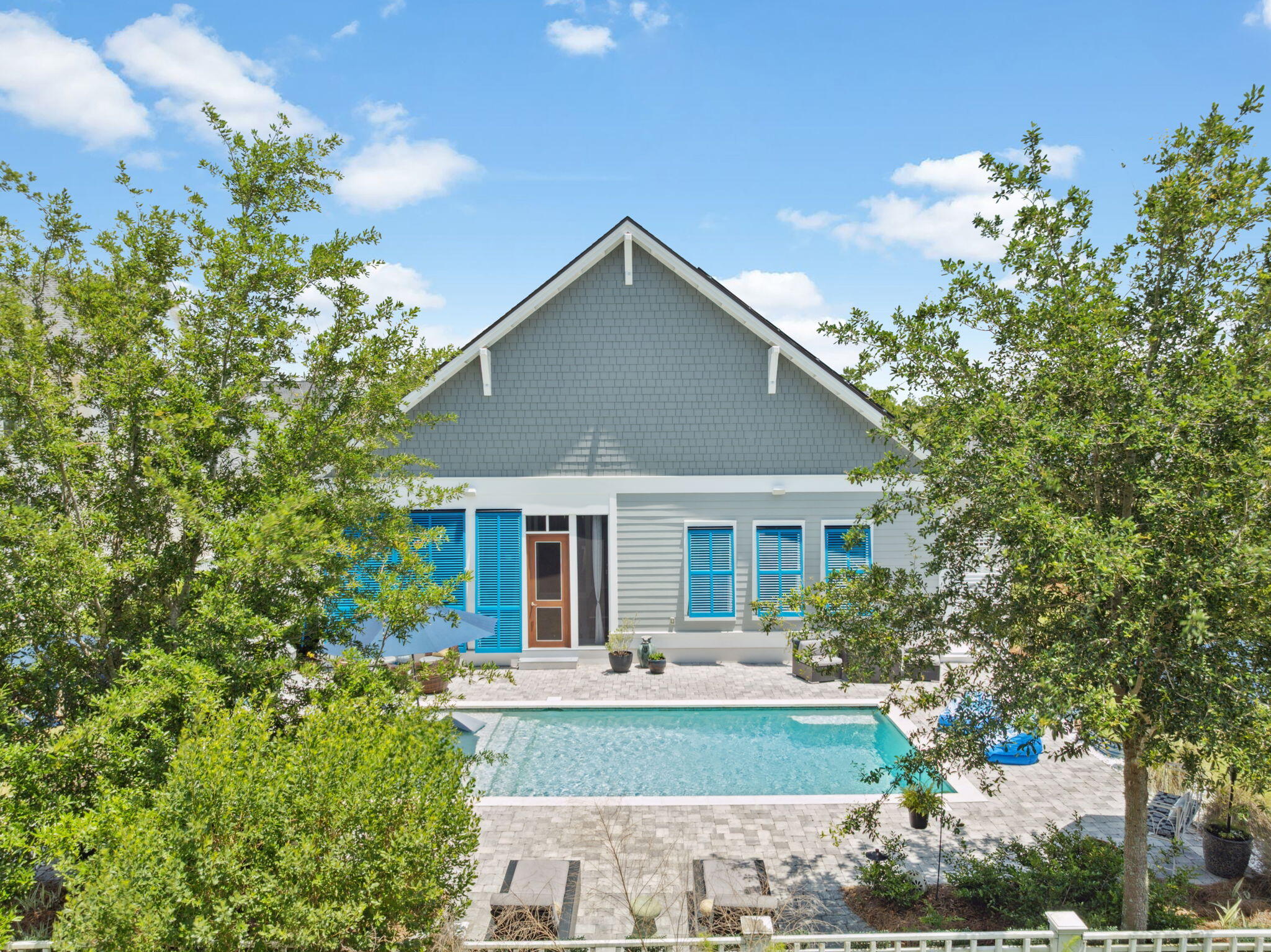 160 Needle Cast Ln Inlet Beach Inlet Beach, FL 32461 - Photo 6 of 53 a front view of house with yard and trees in the background