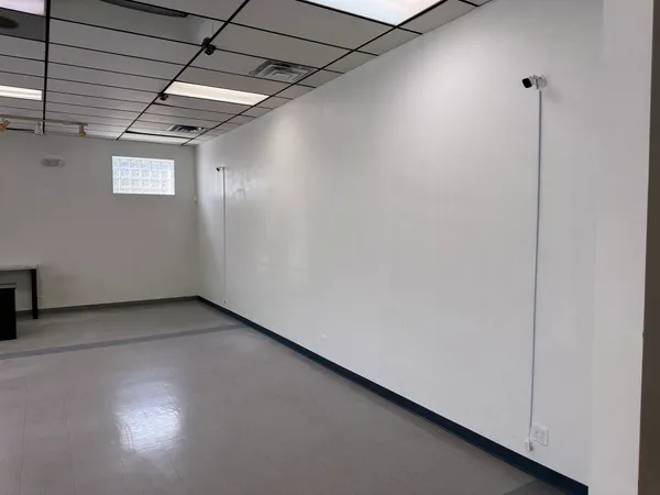 a view of a livingroom with furniture