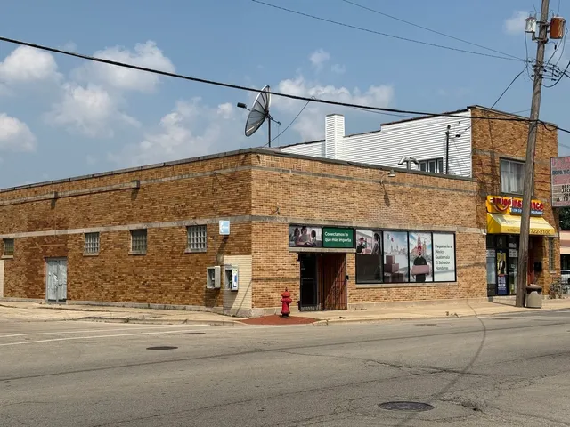 a view of a building on a street