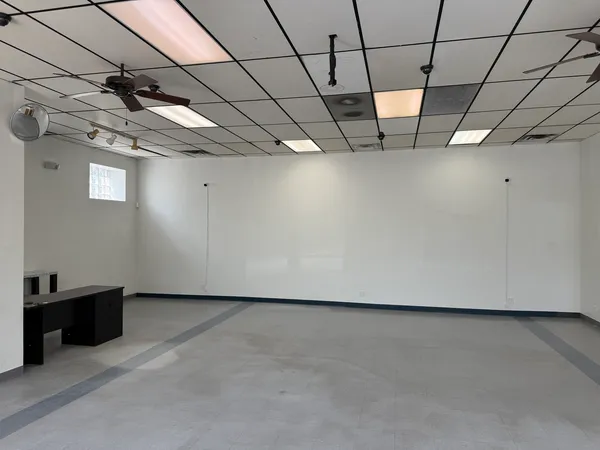 a view of a room with stainless steel appliances