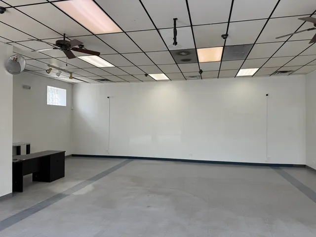 a view of a room with stainless steel appliances