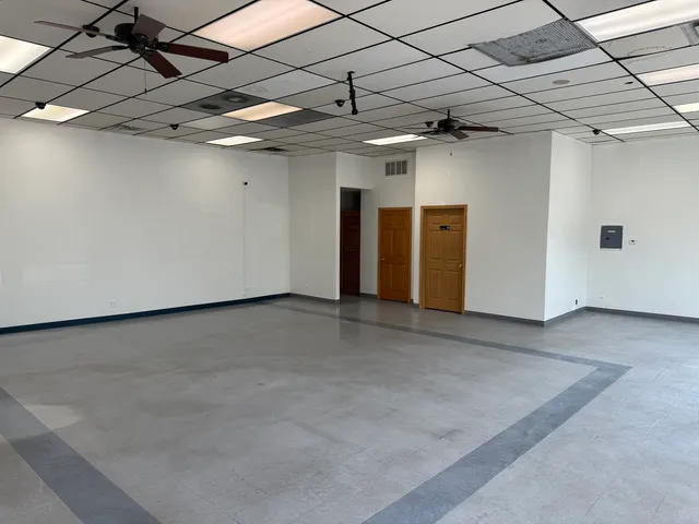 a view of empty room with windows