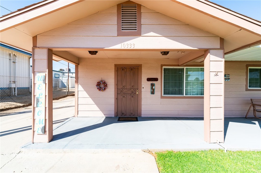 10333 Keller Avenue Riverside, CA 92505 - Photo 1 of 1 a front view of a house with a porch