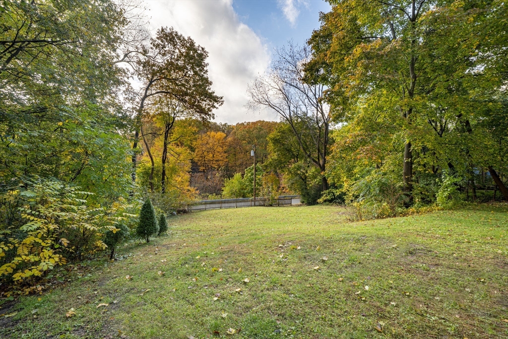 71 School Street, Unit 71 Acton, MA 01720 - Photo 3 of 38 a view of yard with green space