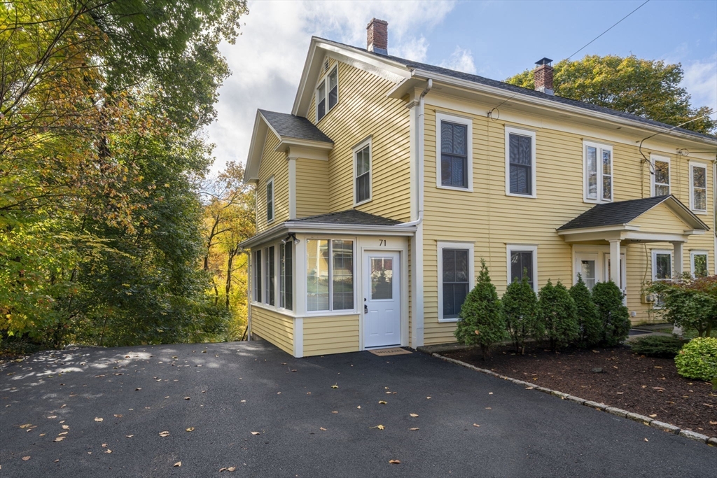 71 School Street, Unit 71 Acton, MA 01720 - Photo 33 of 38 a view of a house with a yard