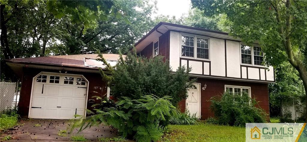 17 Ash Road Edison, NJ 08817 - Photo 1 of 19 a front view of house with a garden
