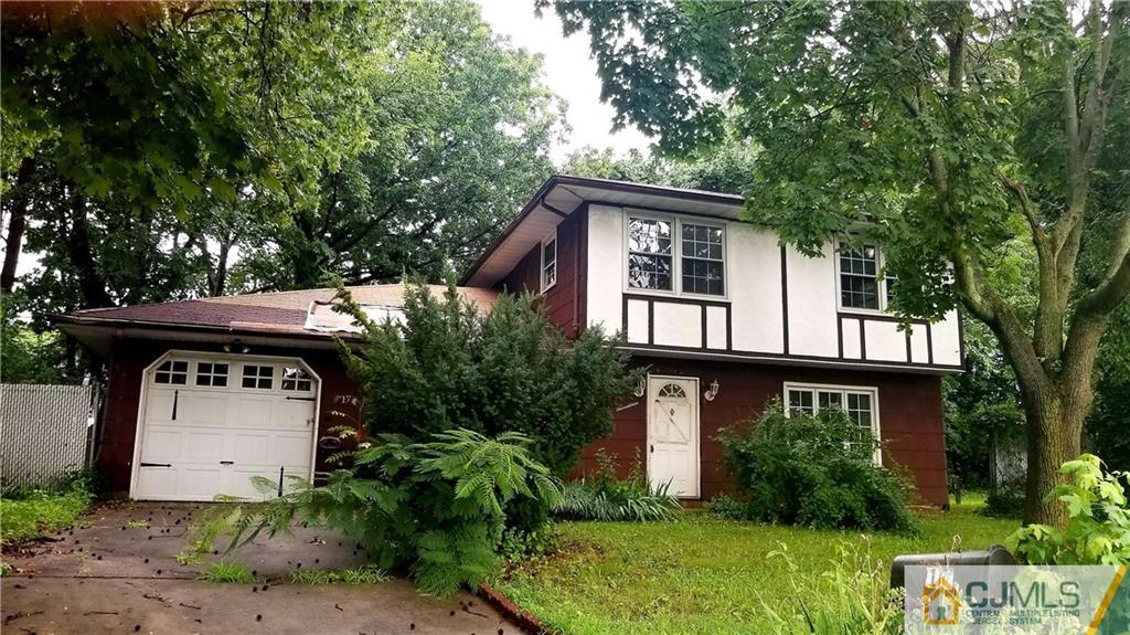 17 Ash Road Edison, NJ 08817 - Photo 2 of 19 a front view of house with yard and trees