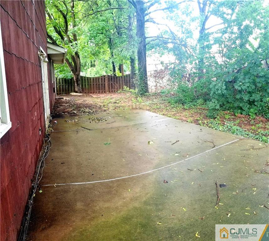 17 Ash Road Edison, NJ 08817 - Photo 18 of 19 a view of a yard with a tree