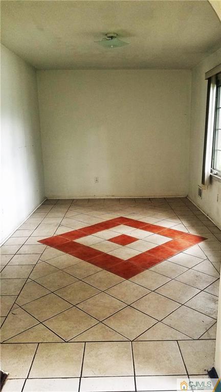 17 Ash Road Edison, NJ 08817 - Photo 5 of 19 a view of a room with tiles