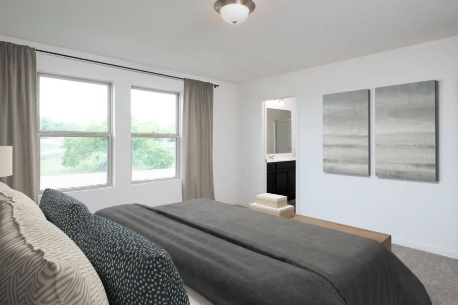 1208 Delta Crest Maxwell, TX 78656 - Photo 4 of 11 a bedroom with a bed and a window