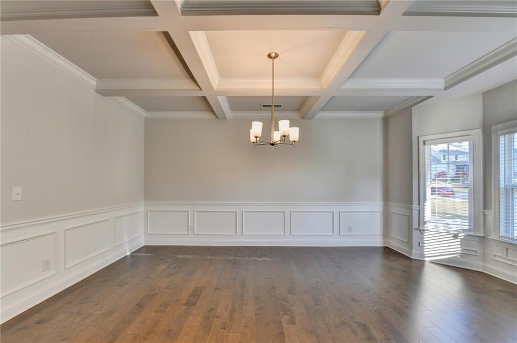 4548 Red Blossom Trail Southwest Powder Springs, GA 30127 - Photo 11 of 72 a view of an empty room with a window