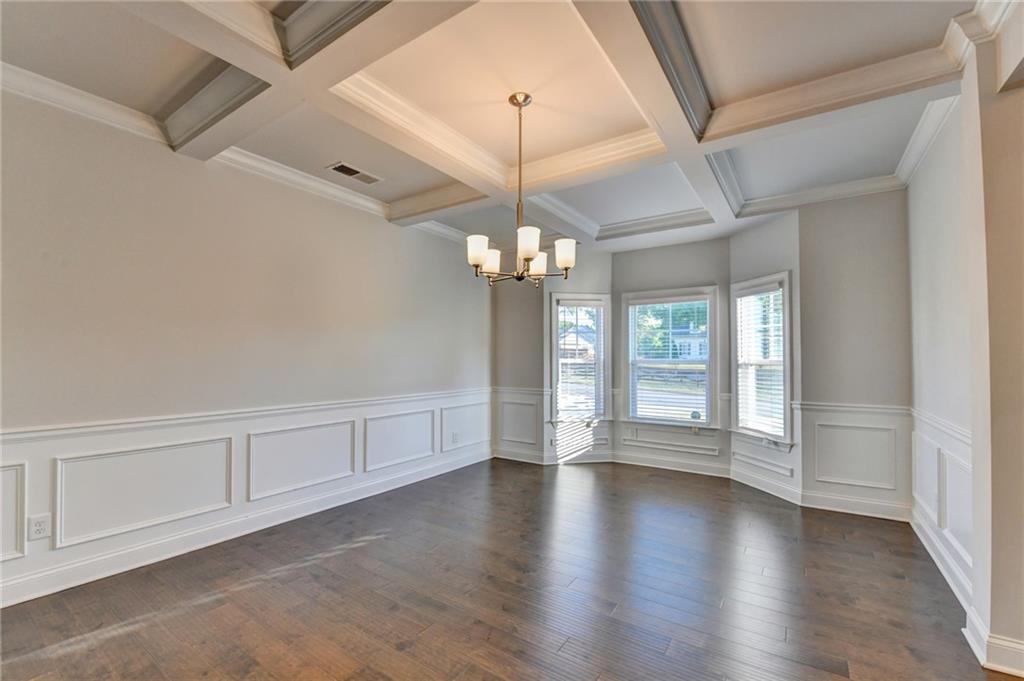 4548 Red Blossom Trail Southwest Powder Springs, GA 30127 - Photo 12 of 72 a view of an empty room with a window