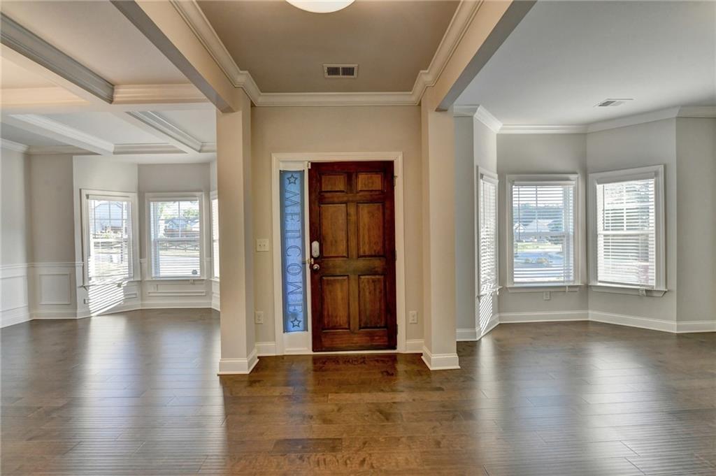 4548 Red Blossom Trail Southwest Powder Springs, GA 30127 - Photo 5 of 72 a view of an entryway with wooden floors