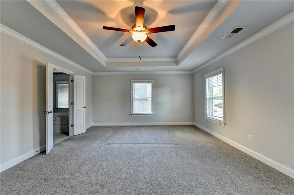 4548 Red Blossom Trail Southwest Powder Springs, GA 30127 - Photo 54 of 72 wooden floor and window in an empty room