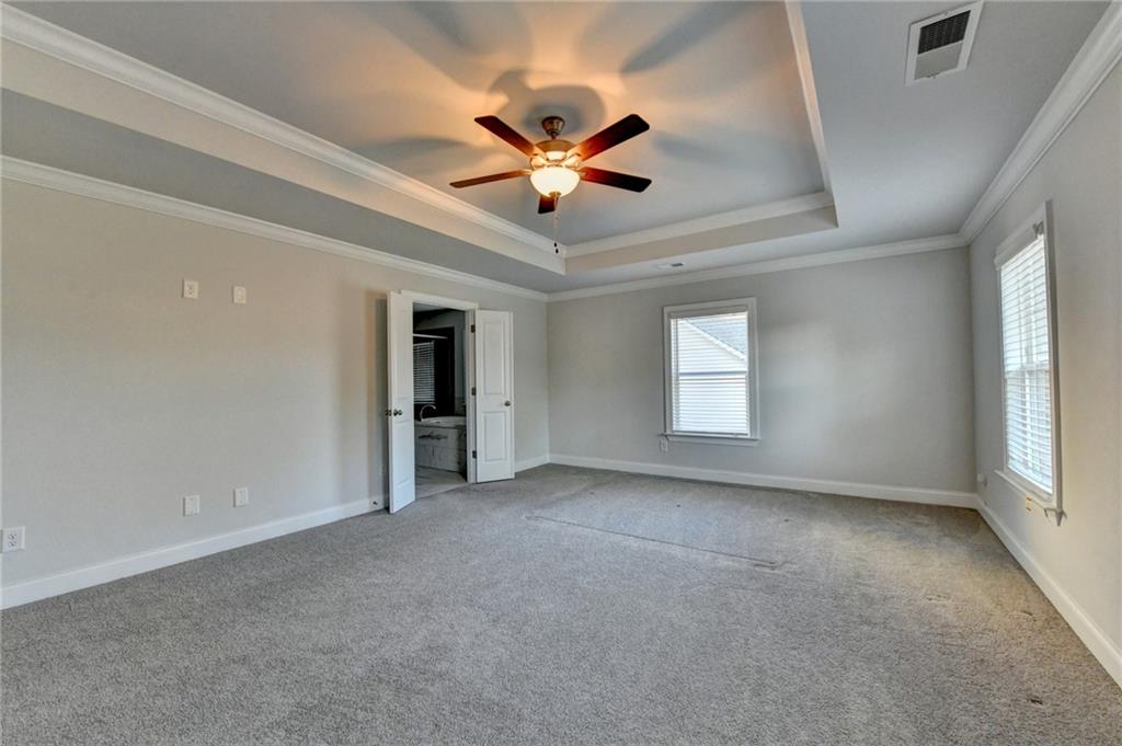 4548 Red Blossom Trail Southwest Powder Springs, GA 30127 - Photo 55 of 72 a view of a livingroom with a ceiling fan and window