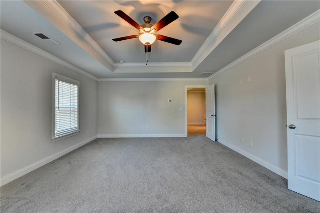 4548 Red Blossom Trail Southwest Powder Springs, GA 30127 - Photo 56 of 72 a view of an empty room with a window