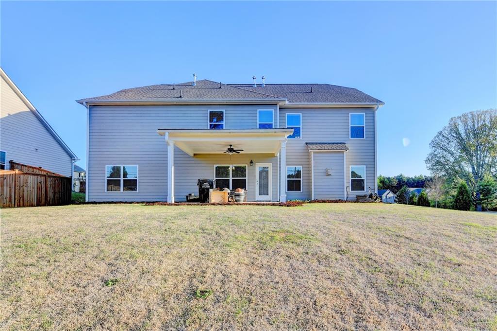 4548 Red Blossom Trail Southwest Powder Springs, GA 30127 - Photo 71 of 72 a view of a house with a patio