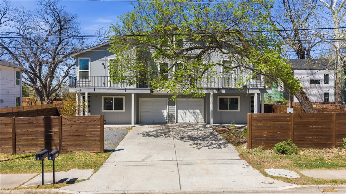 1114 Walton Lane, Unit A Austin, TX 78721 - Photo 2 of 36 View of front of property with driveway, , and a balcony