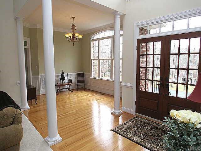 Elegant entry foyer and formal dining area