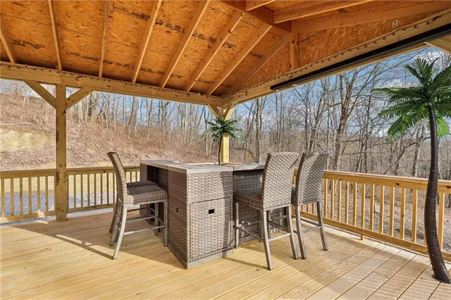 a view of a chairs and table in the patio