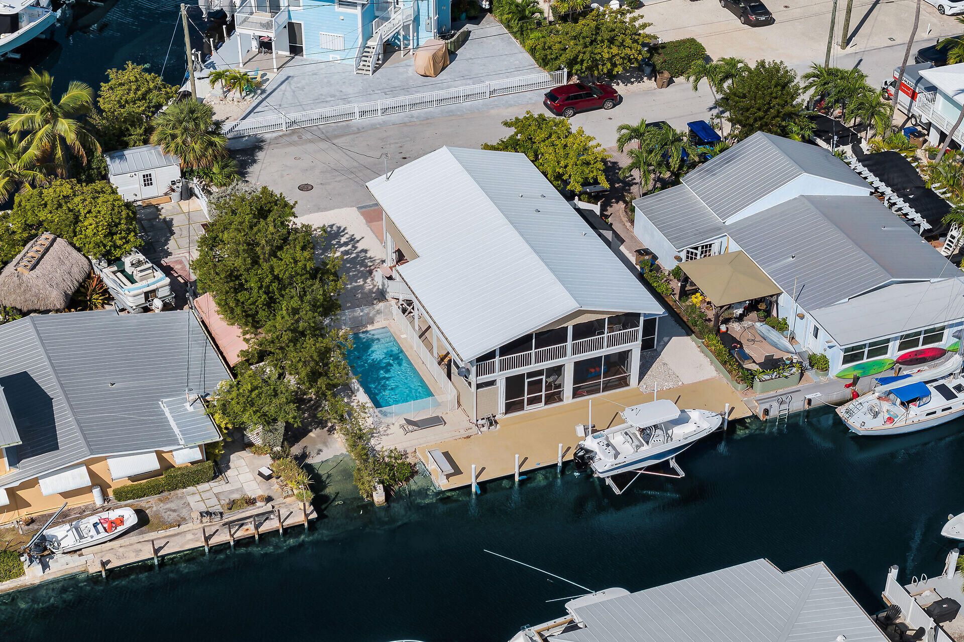119 Primrose Lane Long Key, FL 33001 - Photo 9 of 43 an aerial view of a house with a yard