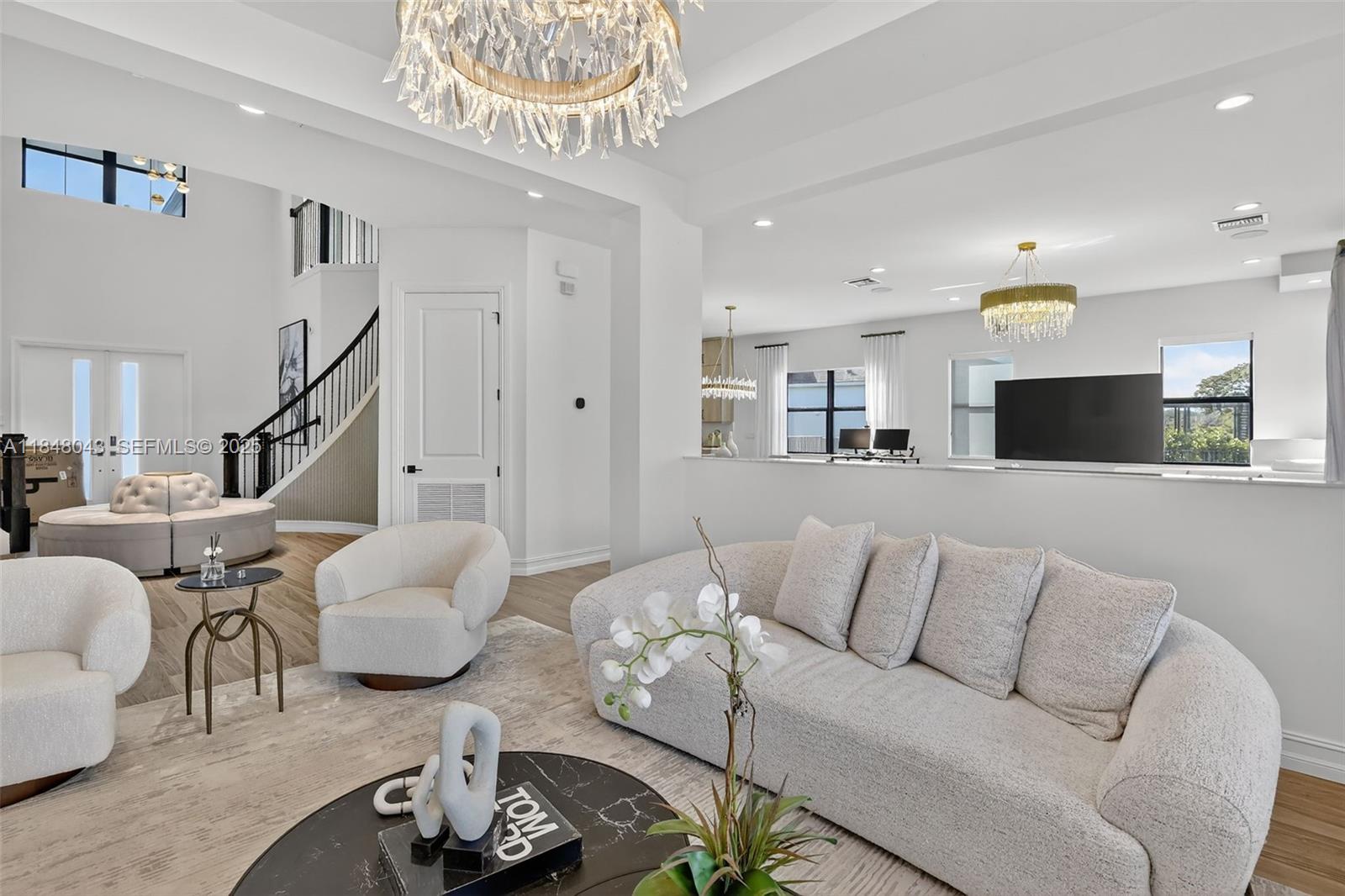 14855 Millstone Ranches Drive Davie, FL 33331 - Photo 18 of 94 a living room with furniture and a view of kitchen