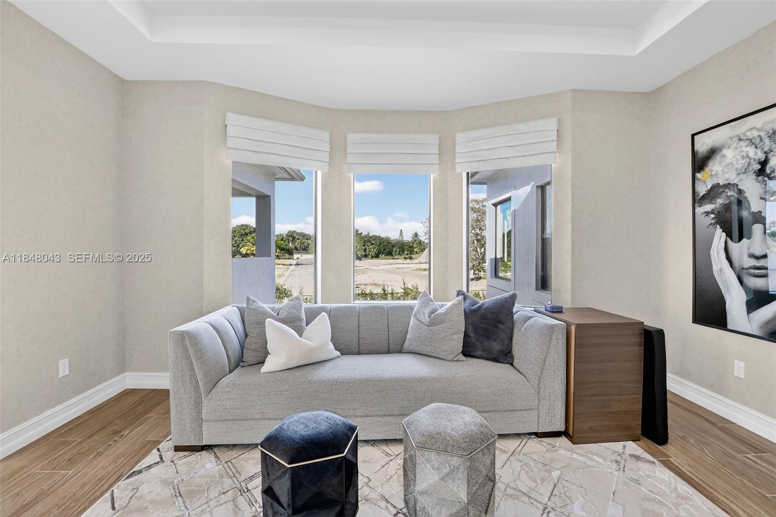 14855 Millstone Ranches Drive Davie, FL 33331 - Photo 35 of 94 a living room with furniture and a large window