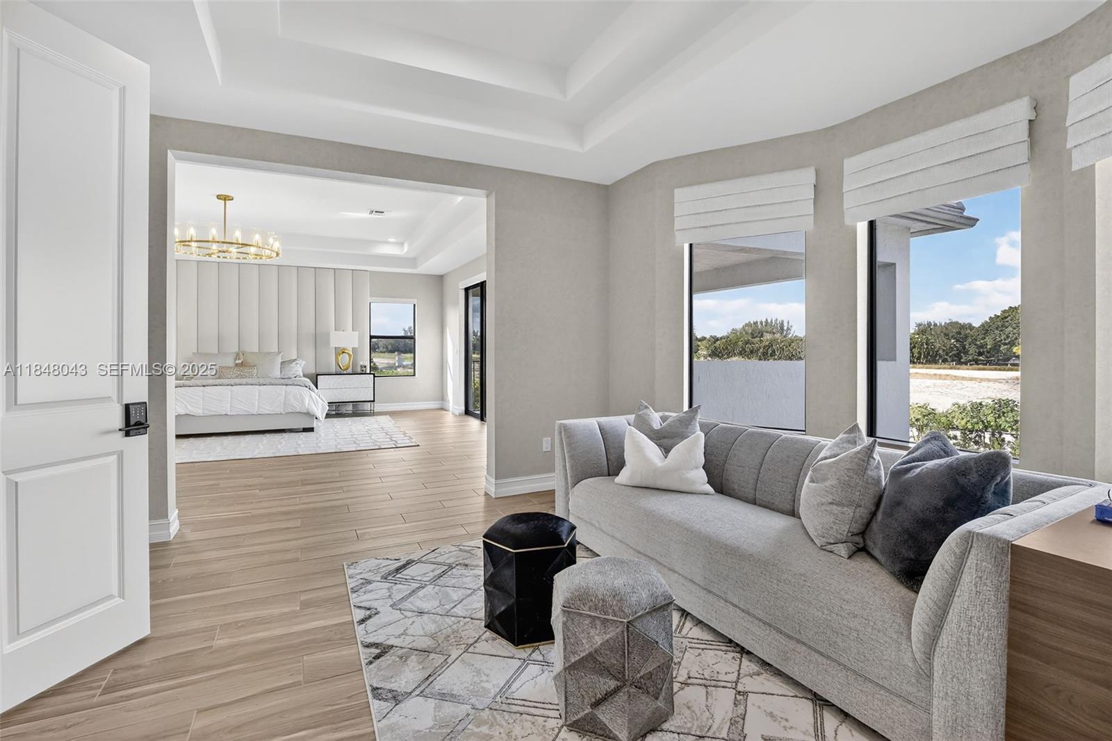 14855 Millstone Ranches Drive Davie, FL 33331 - Photo 36 of 94 a living room with furniture and a large window