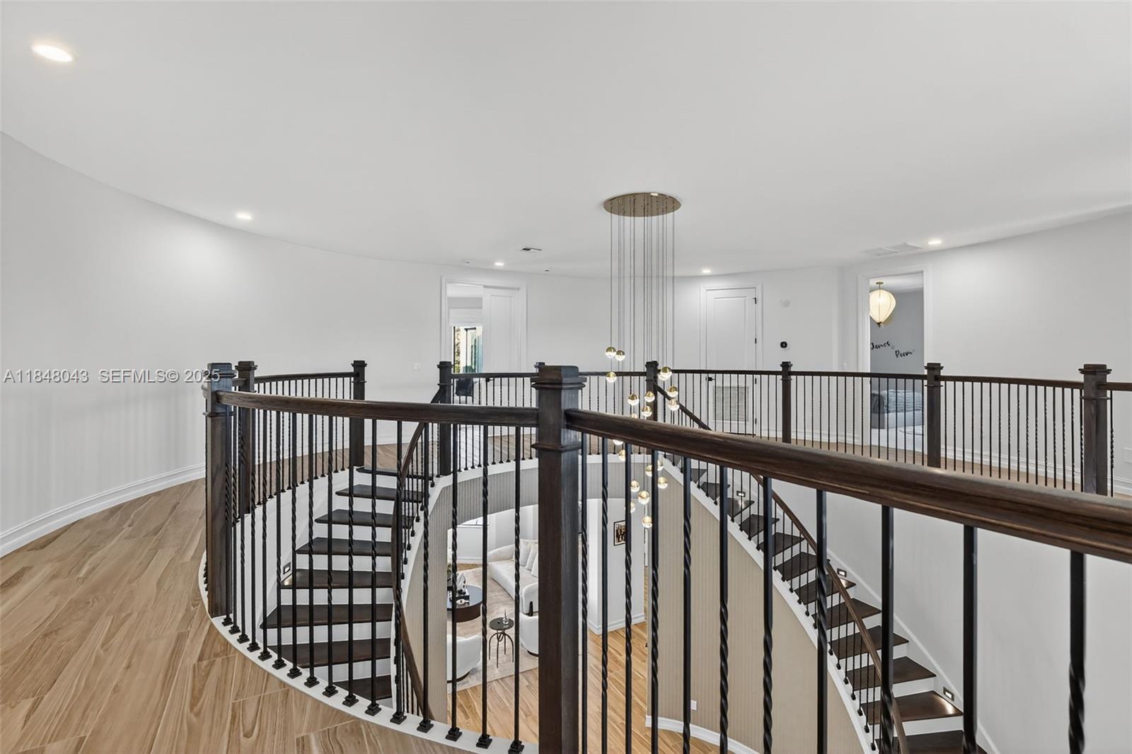 14855 Millstone Ranches Drive Davie, FL 33331 - Photo 38 of 94 a view of a hallway with wooden floor