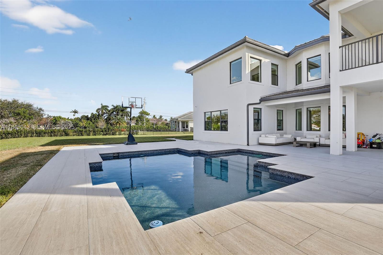 14855 Millstone Ranches Drive Davie, FL 33331 - Photo 5 of 94 a view of a house with a swimming pool
