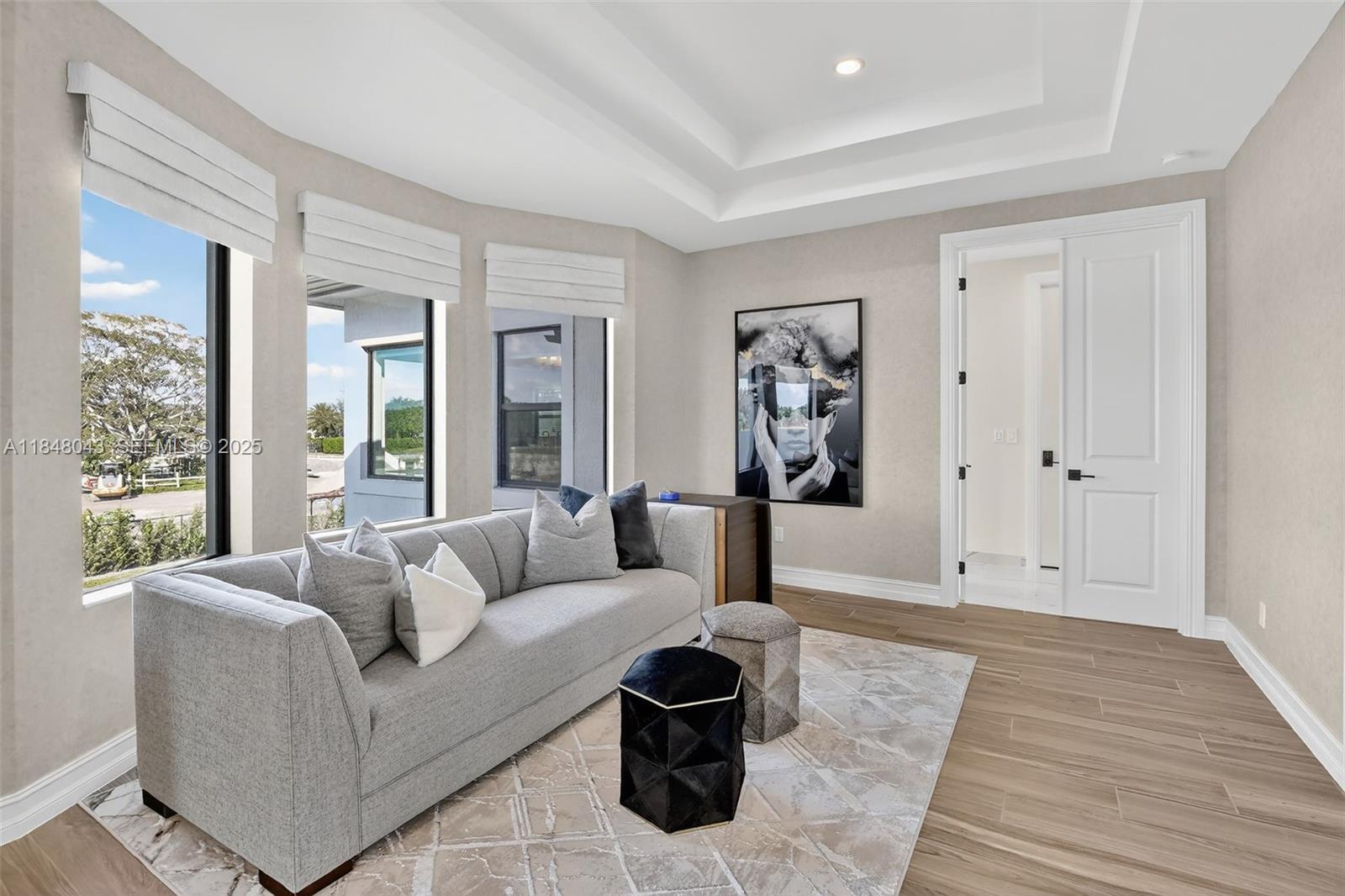 14855 Millstone Ranches Drive Davie, FL 33331 - Photo 58 of 94 a living room with furniture and a large window