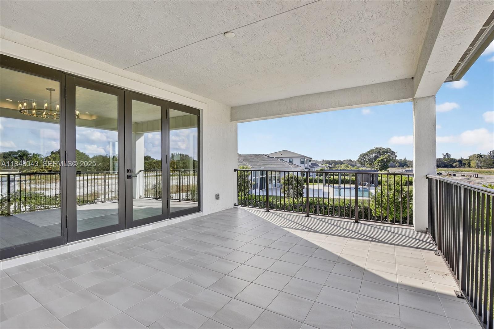 14855 Millstone Ranches Drive Davie, FL 33331 - Photo 63 of 94 a view of a city from a balcony