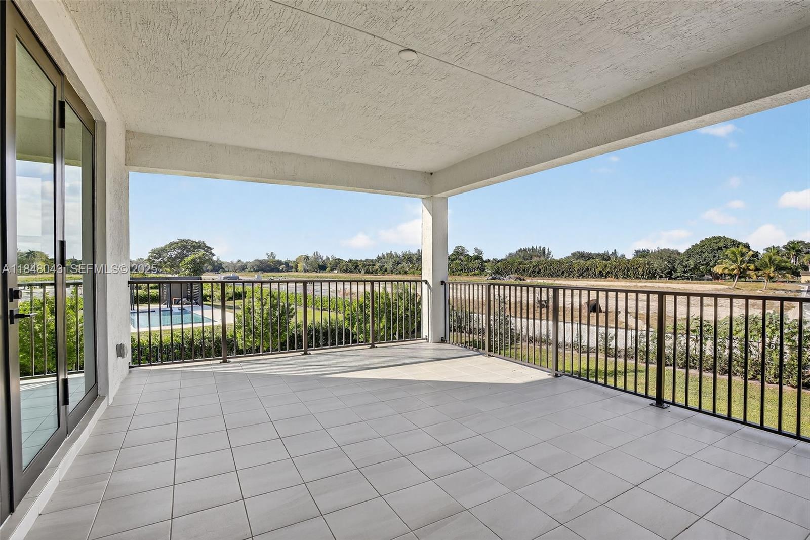 14855 Millstone Ranches Drive Davie, FL 33331 - Photo 64 of 94 a balcony with city view