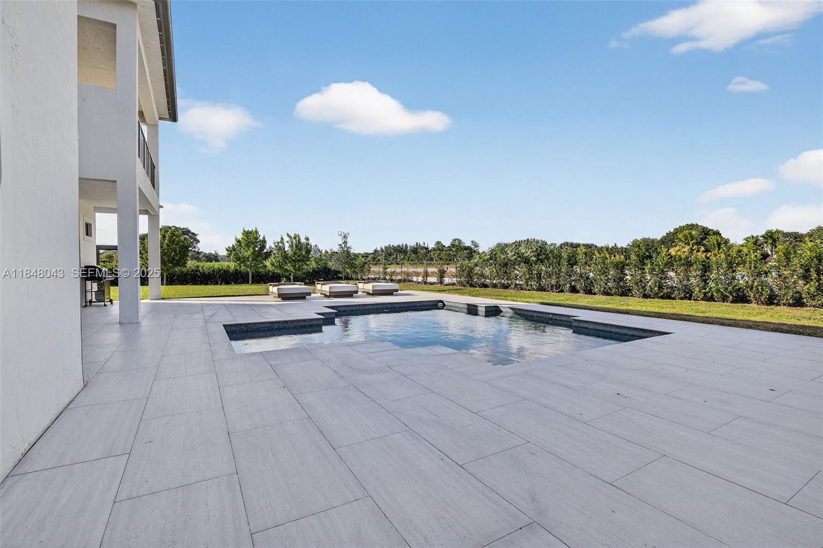 14855 Millstone Ranches Drive Davie, FL 33331 - Photo 83 of 94 a view of swimming pool outdoor seating and outdoor space