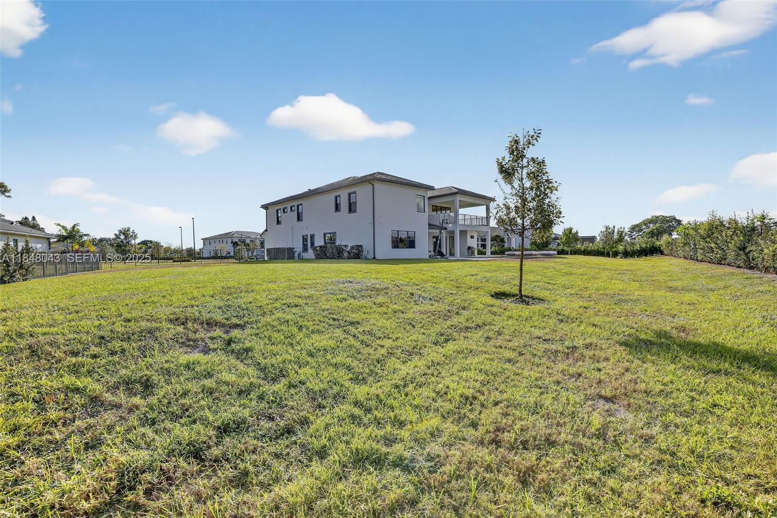 14855 Millstone Ranches Drive Davie, FL 33331 - Photo 92 of 94 a house view with a outdoor space