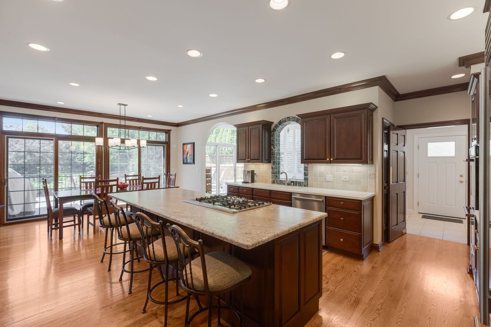 209 Carriage Trail Barrington, IL 60010 - Photo 15 of 42 a view of a dining room with furniture window and wooden floor