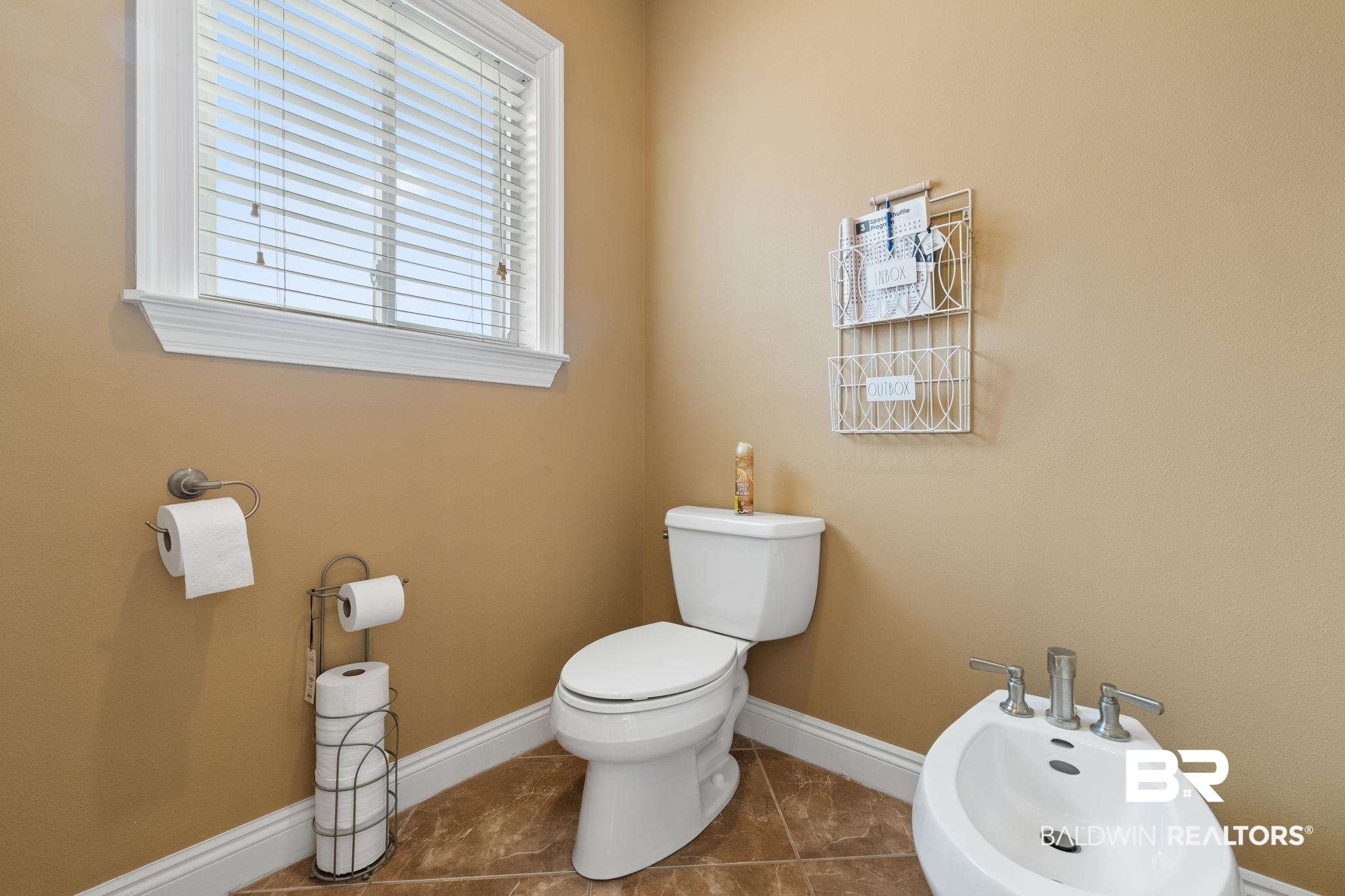 9790 Stucki Road Elberta, AL 36530 - Photo 70 of 72 Bathroom featuring toilet, a bidet, and baseboards