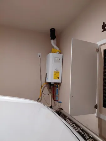 a bathroom with a sink toilet and mirror