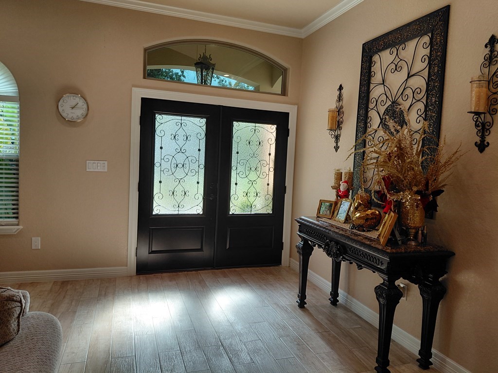 309 Hickman Lane Angleton, TX 77515 - Photo 27 of 33 a view of a workspace with furniture and a window