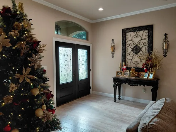 a view of a livingroom with furniture and window