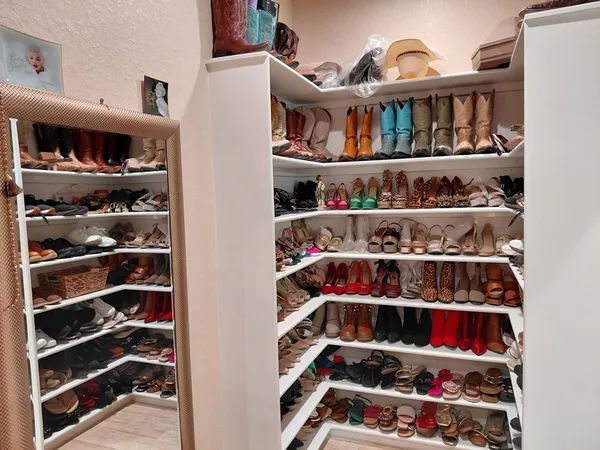 a room with lots of different colored cloths