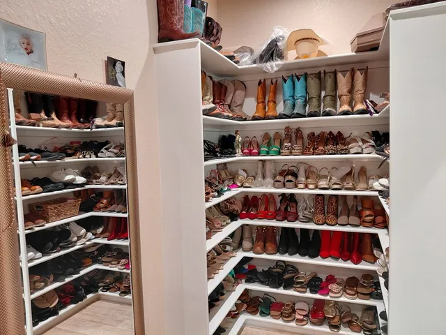 a room with lots of different colored cloths