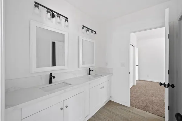 a bathroom with a bathtub and toilet
