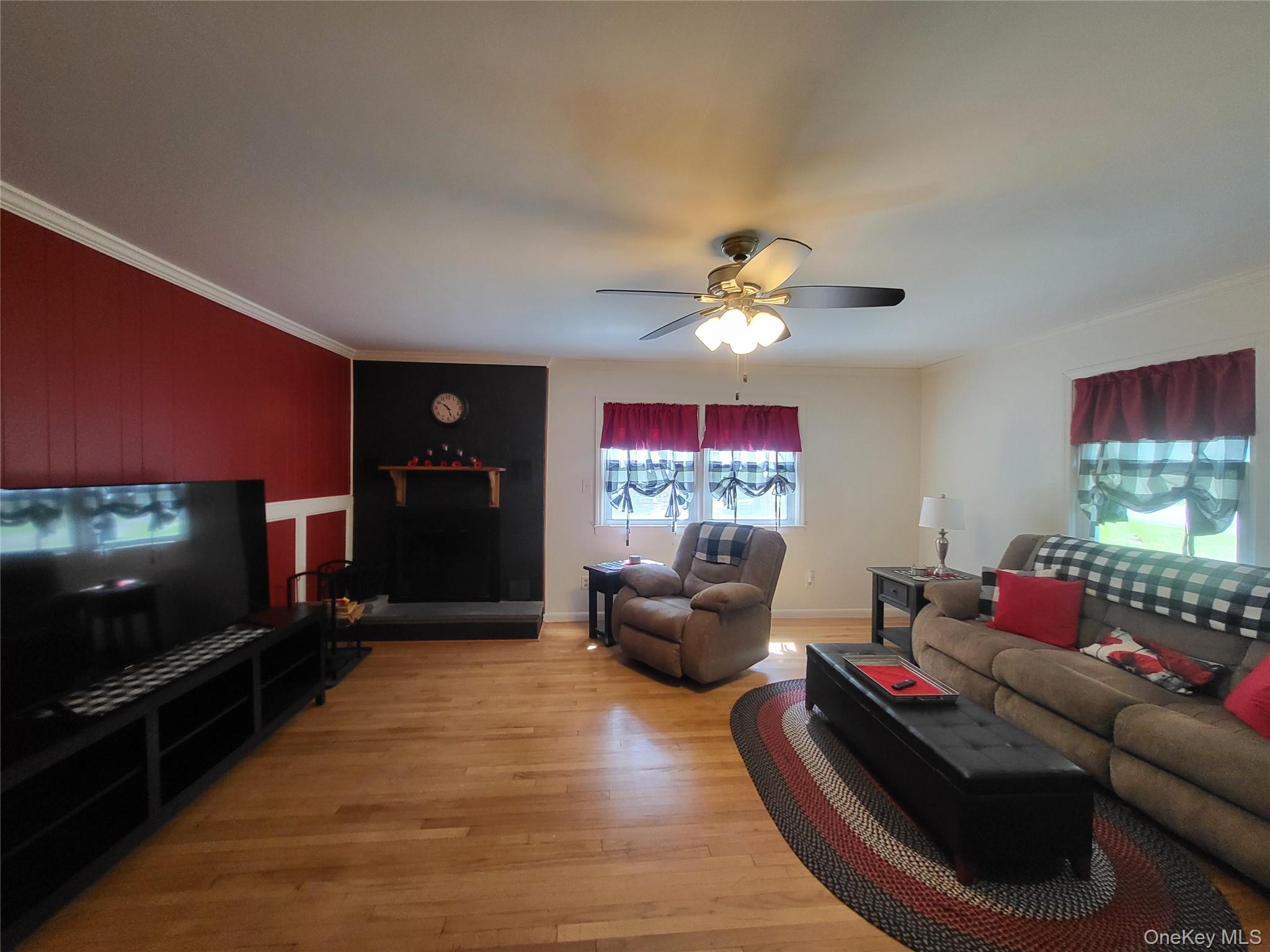 286 Dingle Daisy Road Monticello, NY 12701 - Photo 7 of 35 a living room with furniture and a flat screen tv