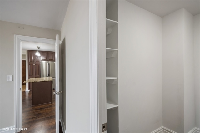 6325 North Sheridan Road, Unit 1005 Chicago, IL 60660 - Photo 24 of 24 a view of a hallway with wooden floor