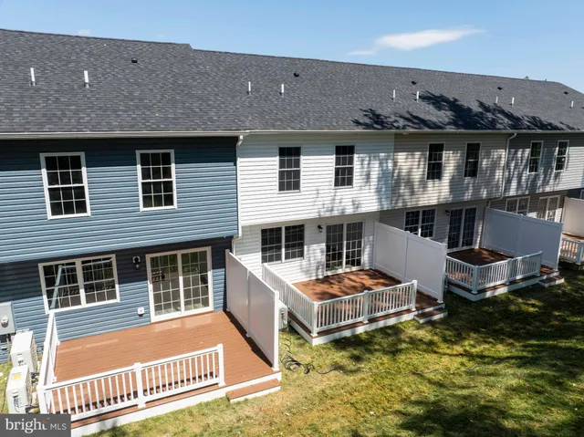 a view of a house with pool and porch